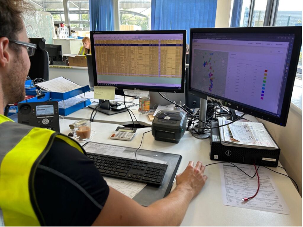 David Welch looks at his monitor as he plans a route.